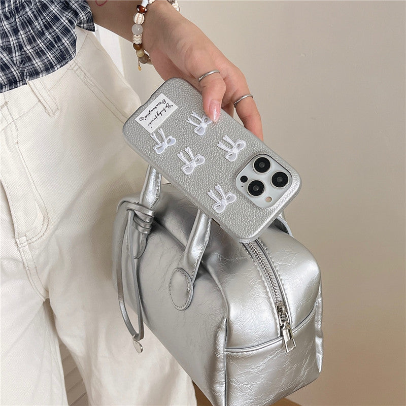 Simple Silver Leather iPhone 15 Pro Max Case – Elegant Bow Design Protective Cover