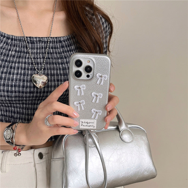 Simple Silver Leather iPhone 15 Pro Max Case – Elegant Bow Design Protective Cover